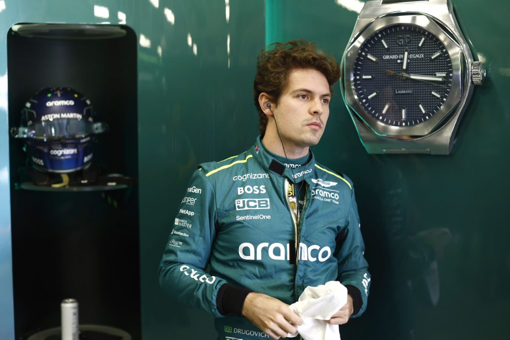 Felipe Drugovich, Aston Martin F1 Team, suits up in the garage