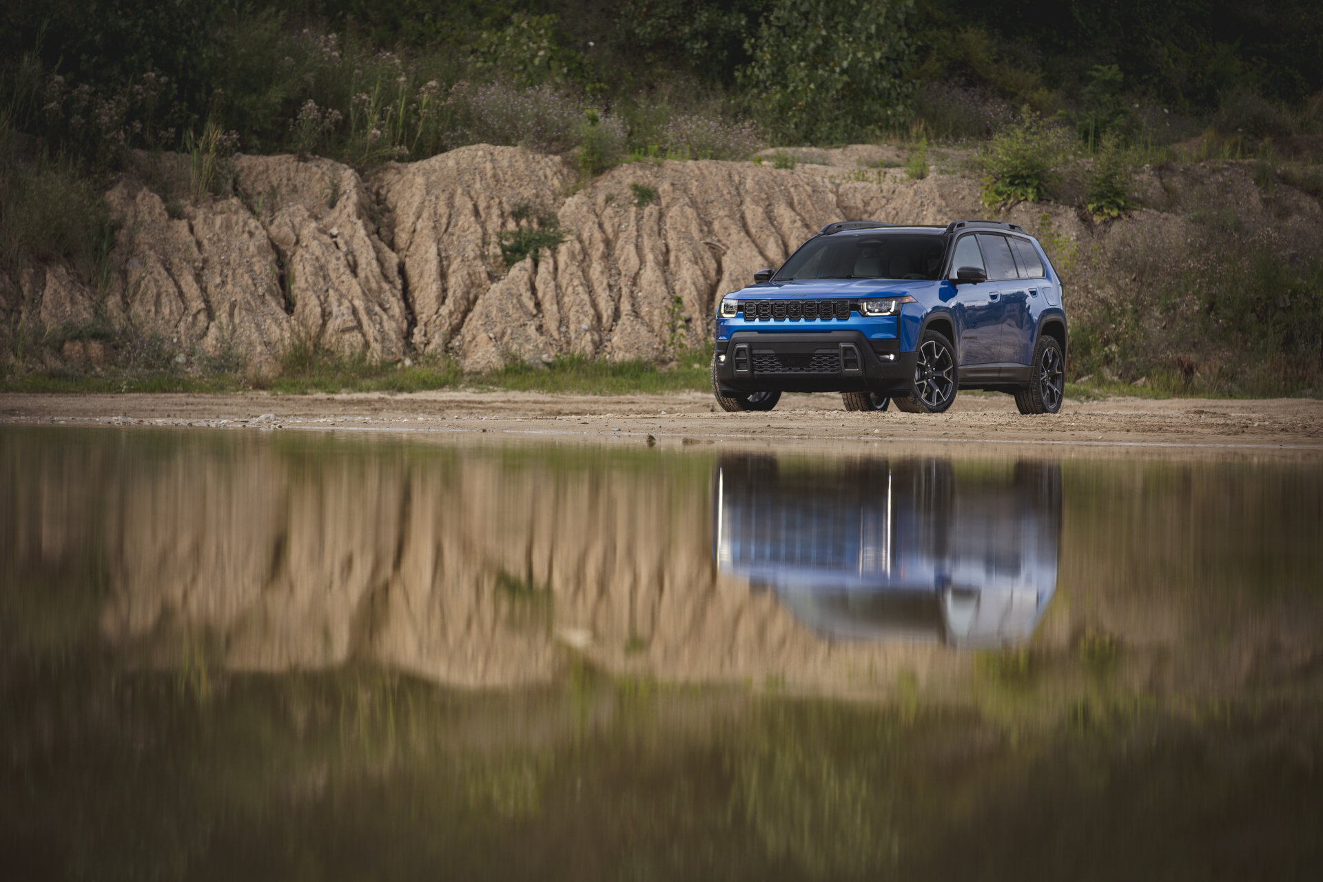 2026 Jeep® Cherokee in front of reflecting water