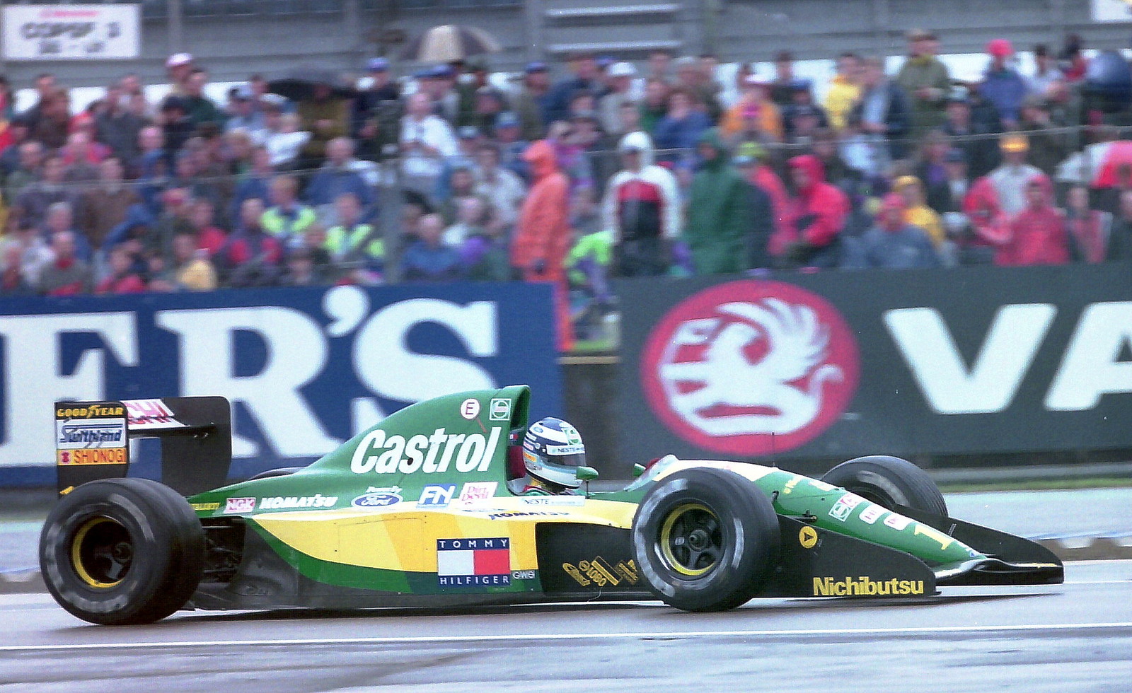 Mika Hakkinen - Lotus 107 exits the pit lane during practice for the 1992 British Grand Prix, Silverstone